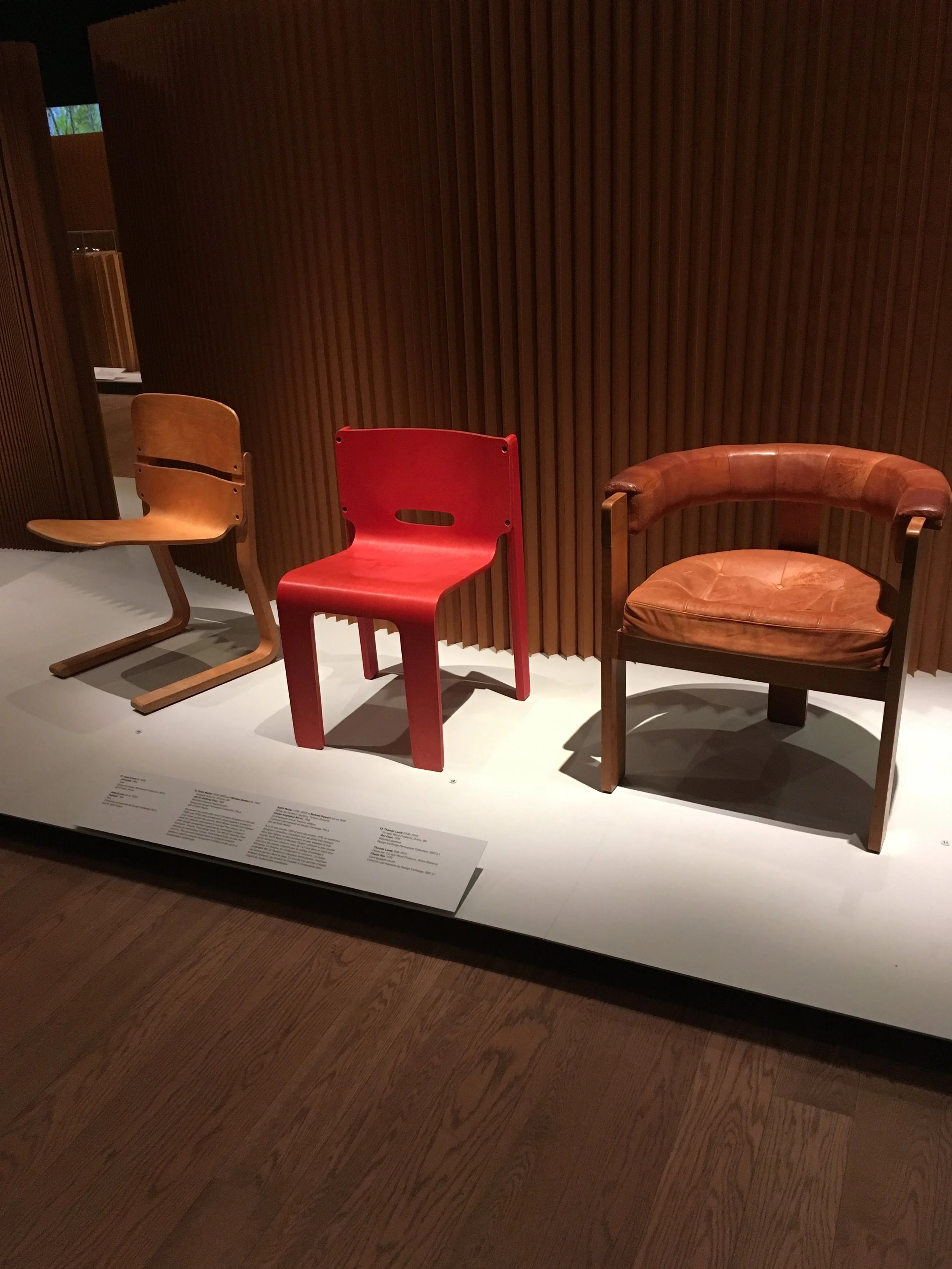 I'm not a fan of red, but I would allow this chair into my home. The one on the right with the tufted seat is my favourite though.