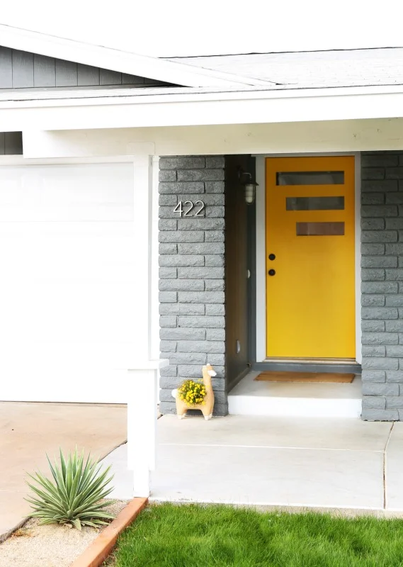 Kate searched for a mid century style door with no luck. Her husband bought a solid door & created this master piece! The pop of yellow paint screams summer to me, I'm very jealous as it is winter here.