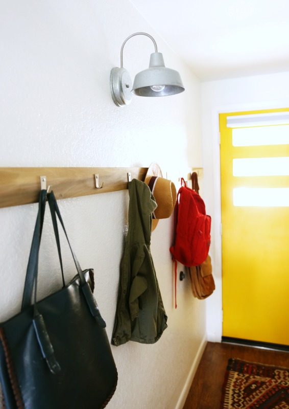 The addition of wall hooks are very practical & stylish in the entryway.