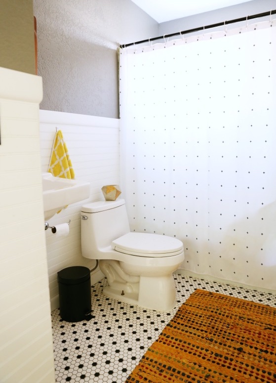 I love the patterned tile, such a graphic element in a small space.