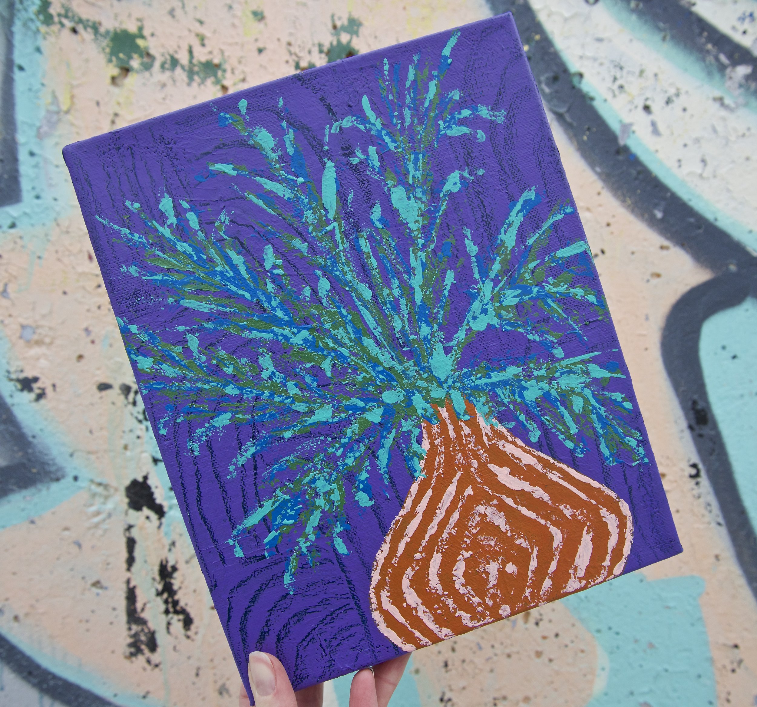 I painted the vase first on this canvas, it was inspired by a piece of orange pottery that was my Grandma's.