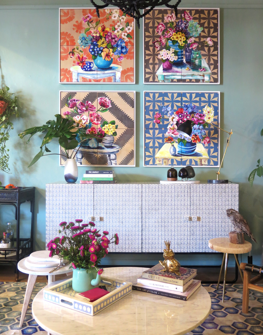 The graphic patterns in the work of Ali Wood are a modern juxtaposition to the floral arrangements. I think they look wonderful grouped together in this vignette.