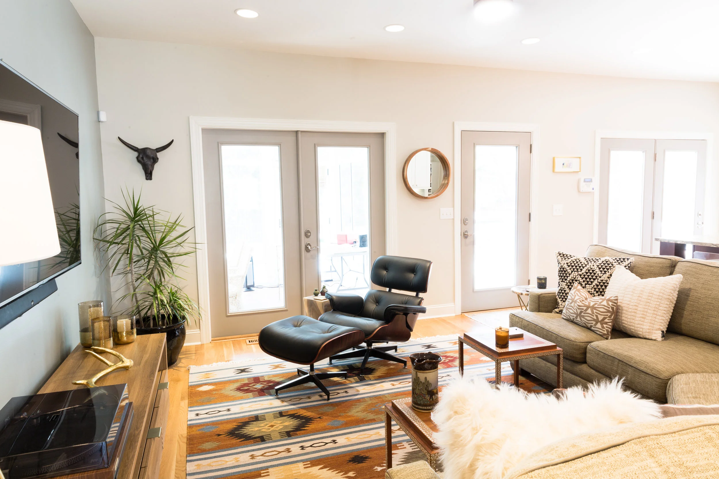 Lots of comfy cushions create a welcoming spot to cuddle.