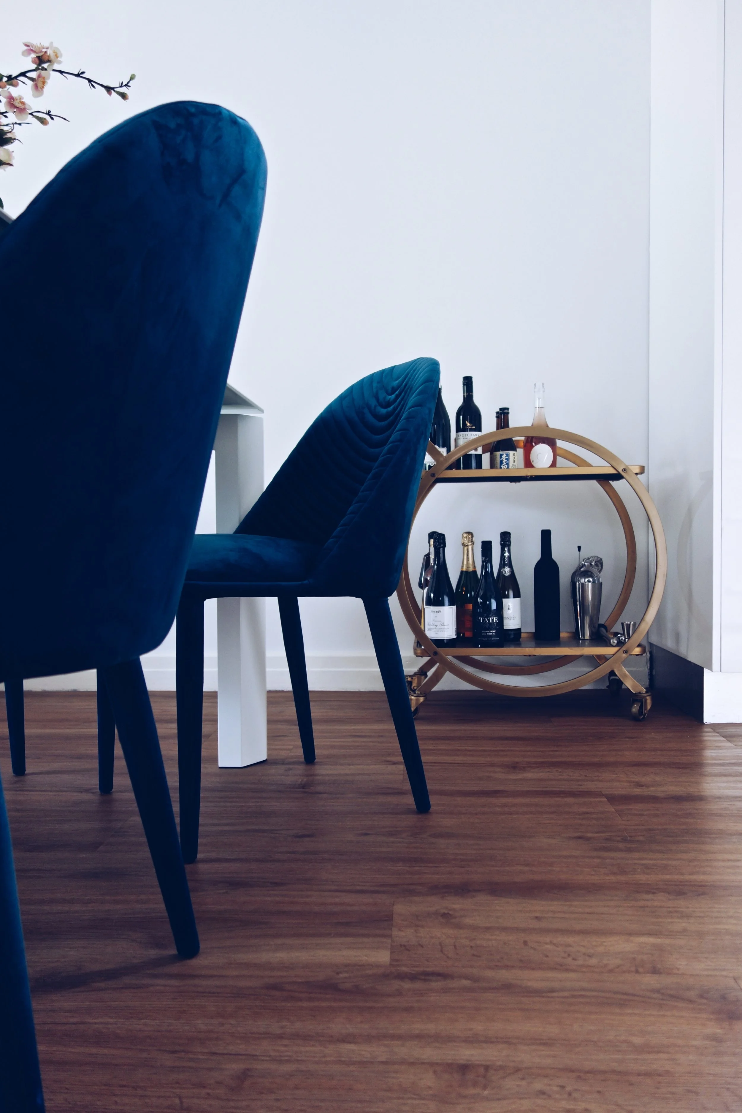 Those dining chairs look so comfy. My eyes are instantly drawn to the subtle pattern on the back. It's details like these that make the space unique.