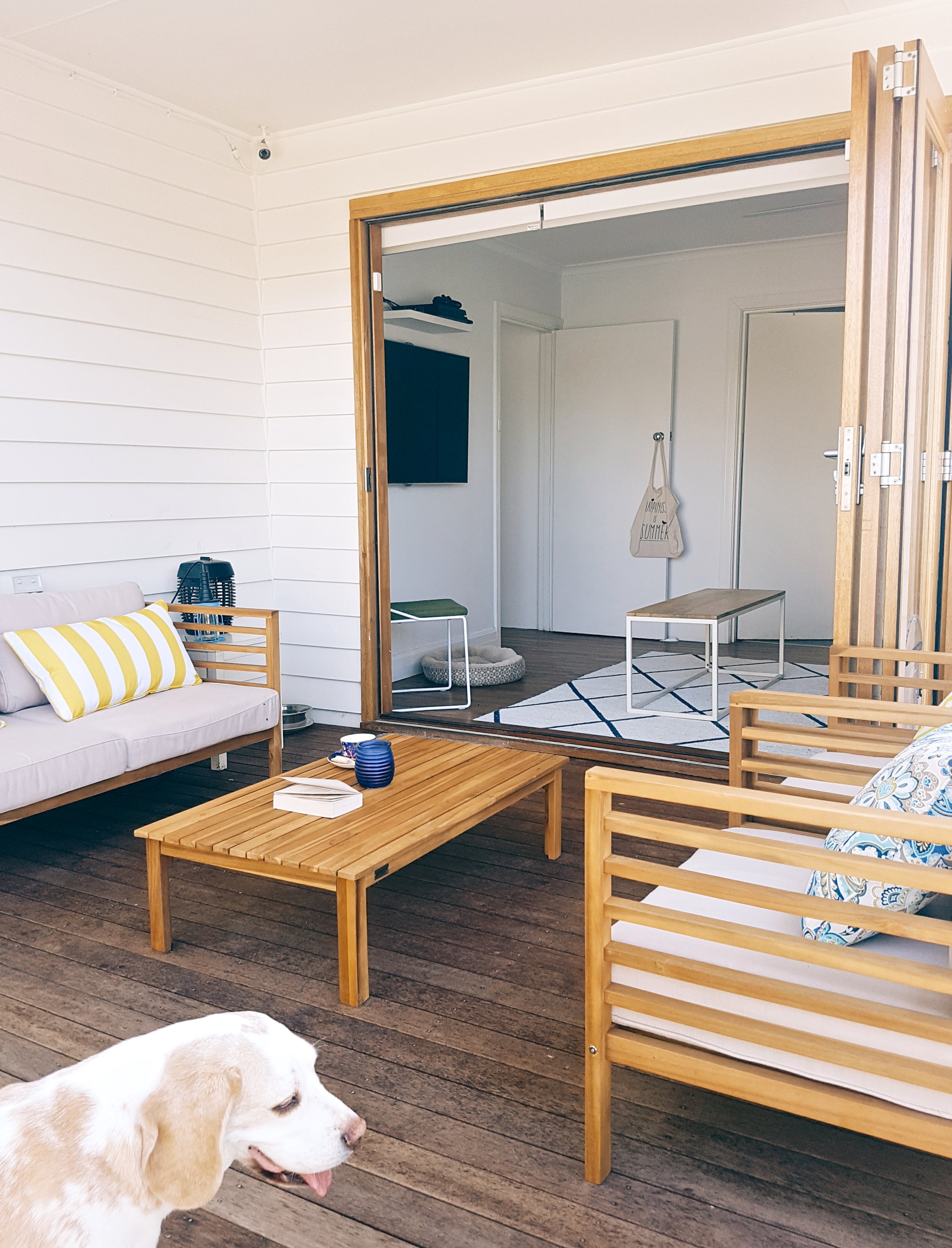 I'm so jealous of the bi fold doors, they really do blend the two spaces together. You can watch the television from either area....movie night!