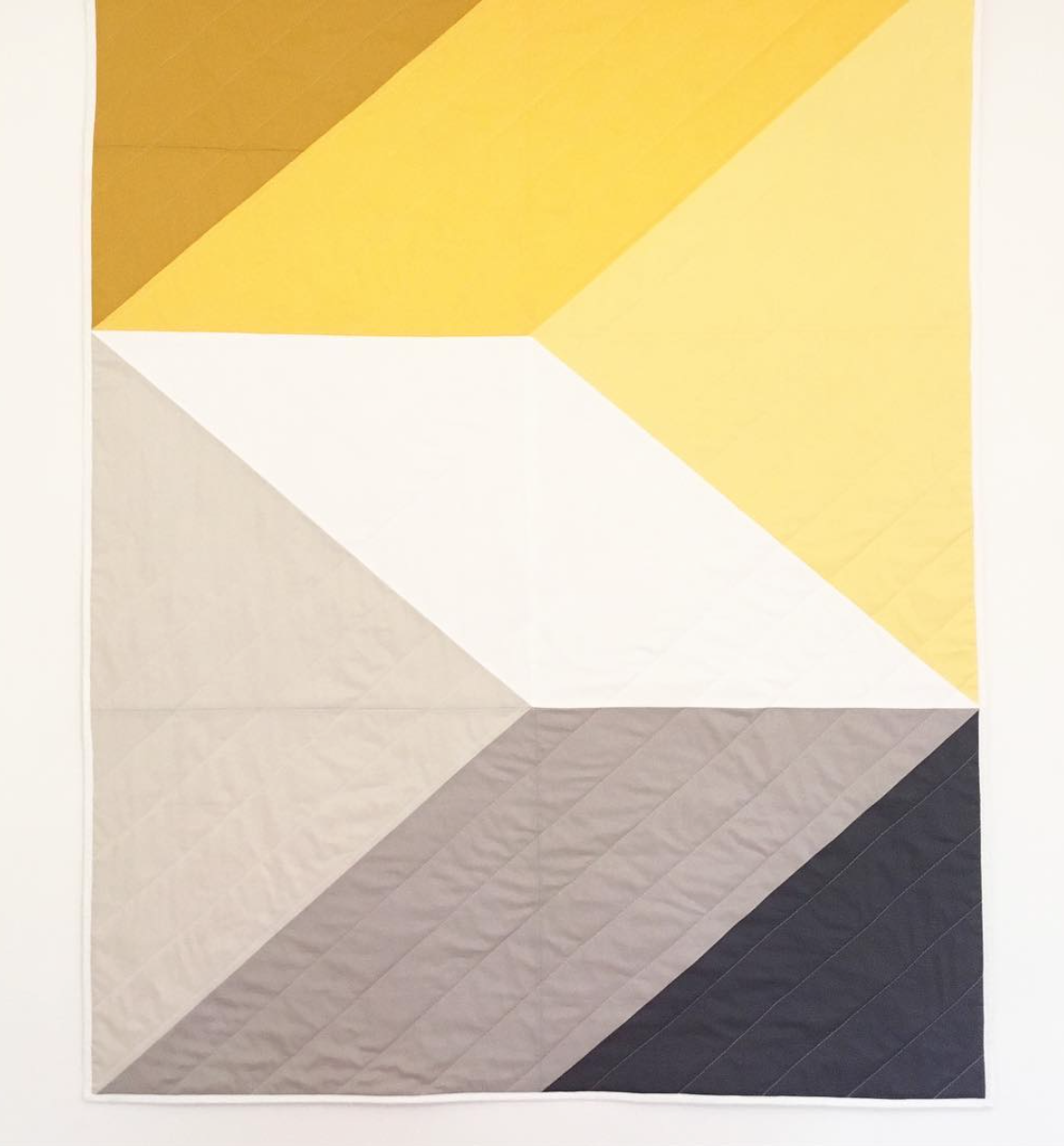 The geometric pattern and colours on this piece really caught my eye.