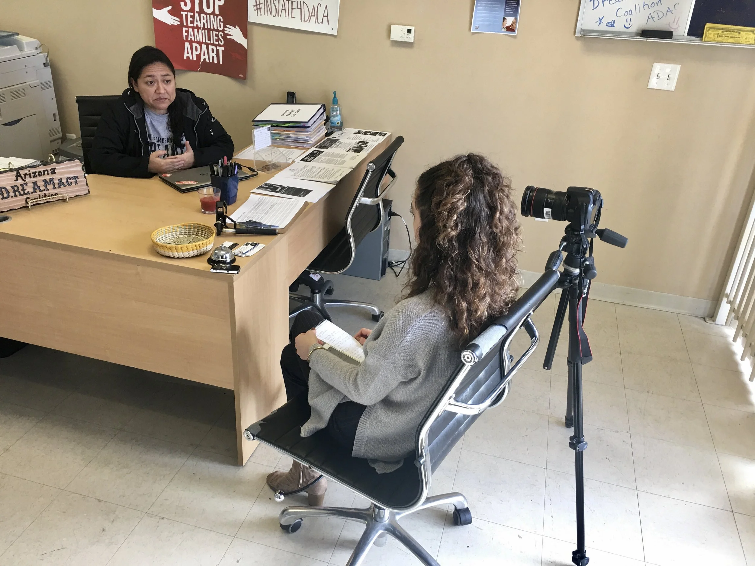 Interviewing Karina Ruiz, president of the Arizona Dream Act Coalition, about breaking DACA news on assignment for Cronkite News. (Photo by Lillian Donahue)