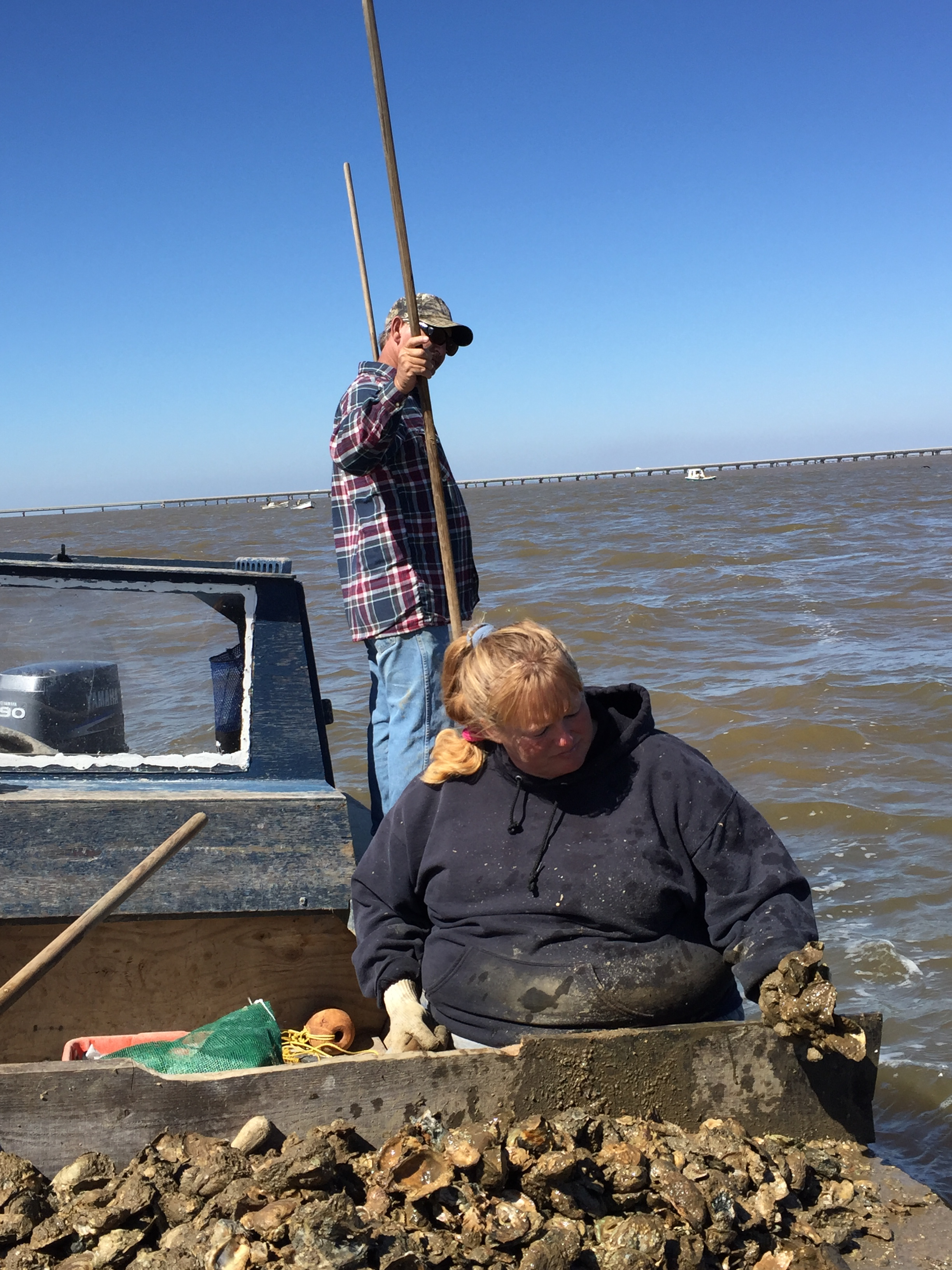 Eugene and Delene Millender-King working on their oyster boat