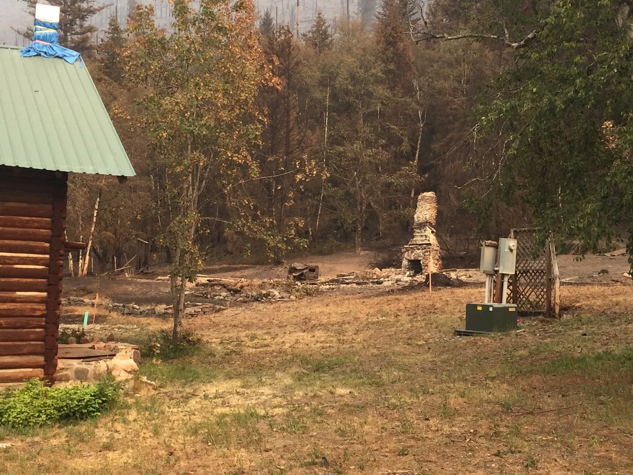 All that is left of one of the four cabins consumed by the fire.