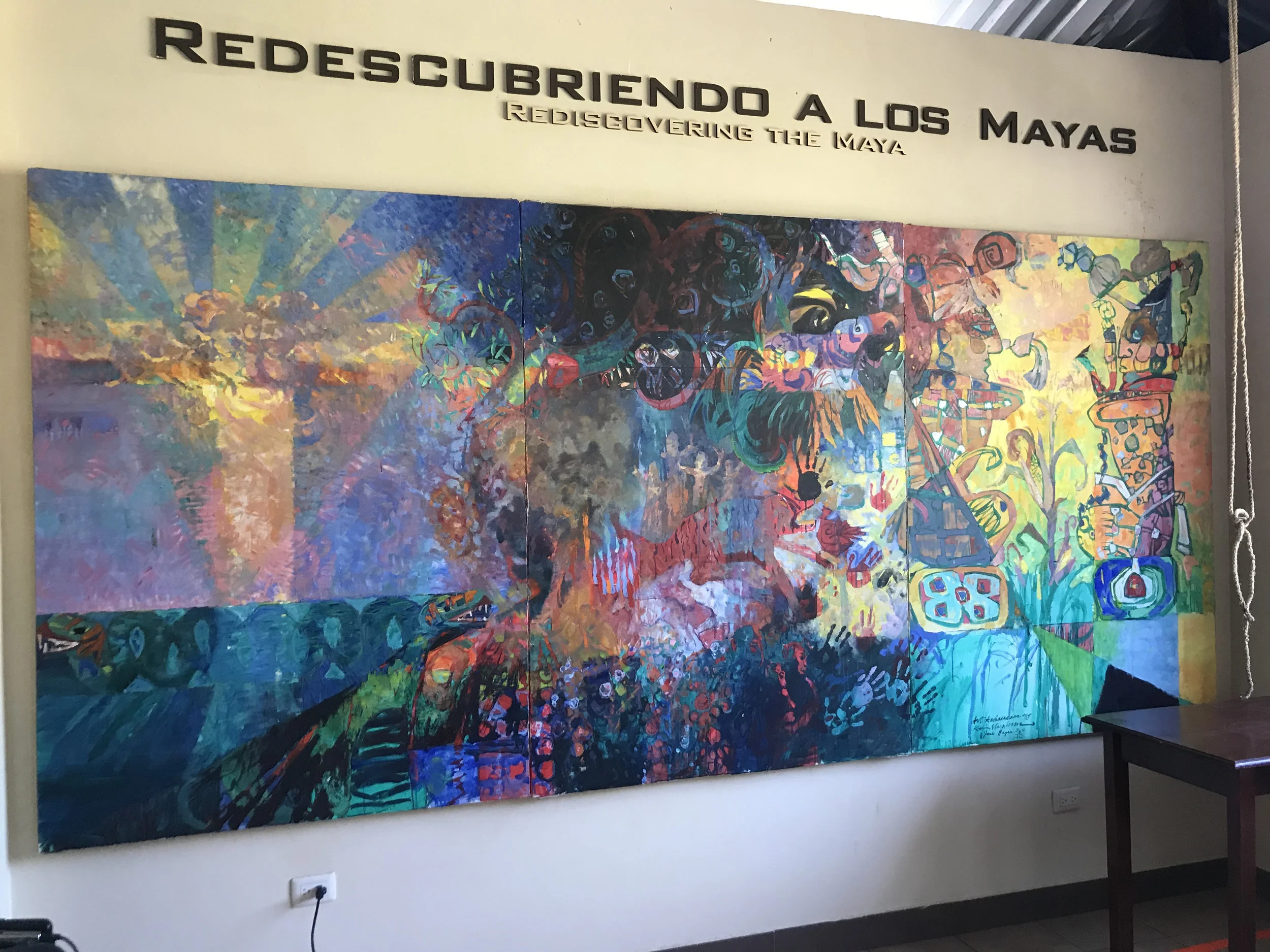Mural painting by Art Ambassador for a Colorful World on a previous trip. Kevin gave us the whole story.