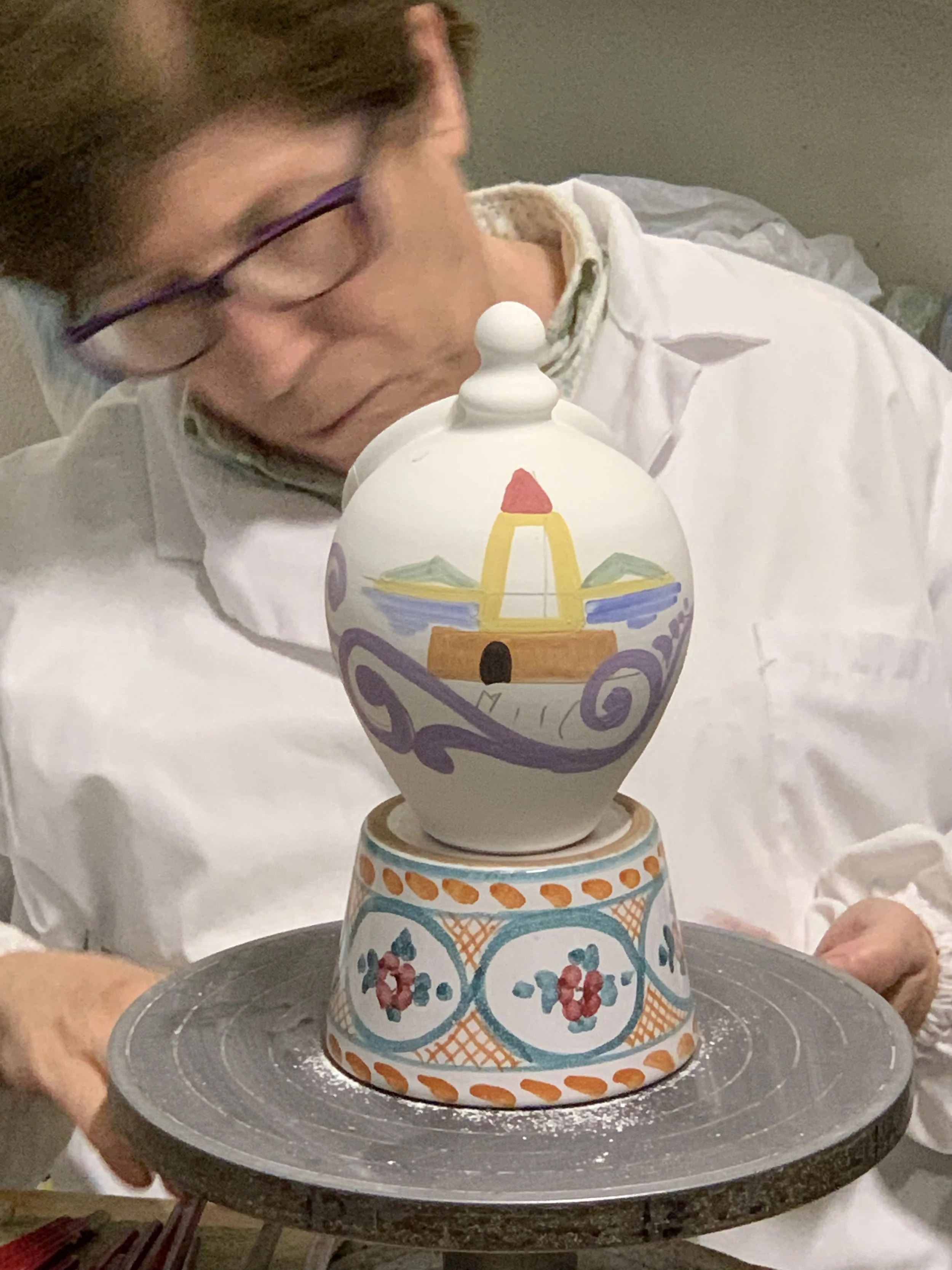 And so has she! Later, we painted our own small pieces of pottery. I will spare you images of the results.