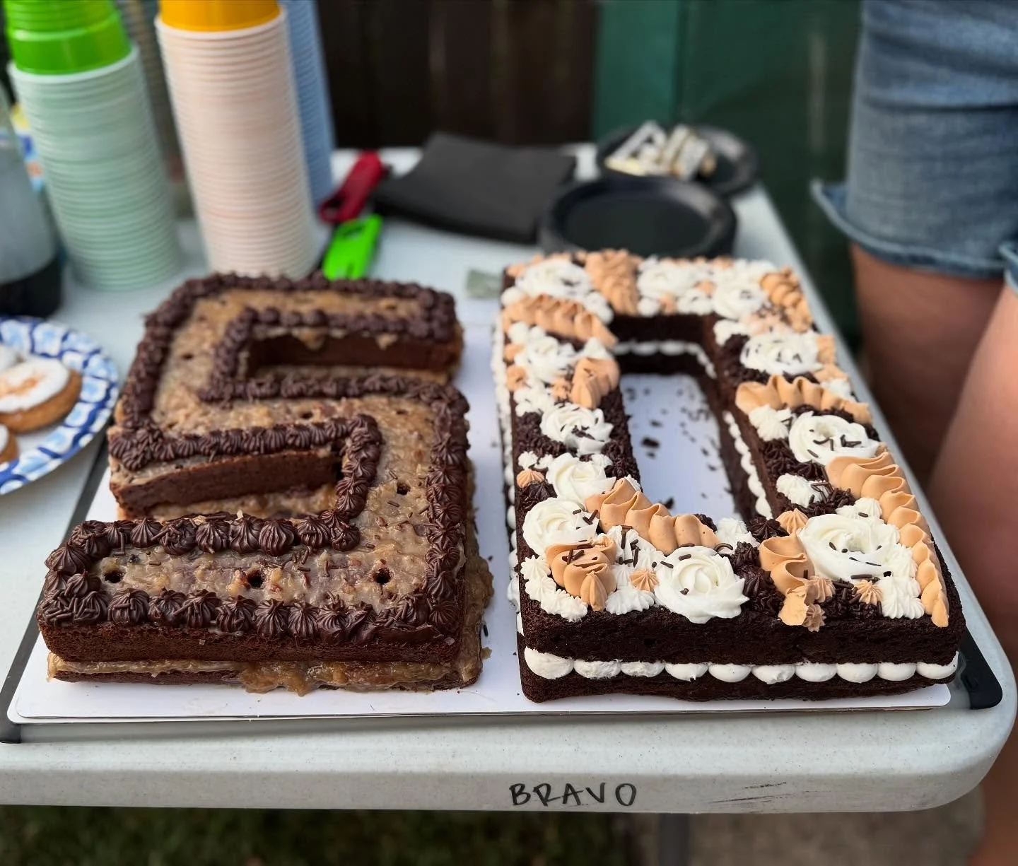 We had nothing to do with this cake (other than helping murder it) but still want to give love to the home baker who walked into our friend&rsquo;s 50th birthday with this thing on her shoulder. Now how to ask if she wants to be friends without just 