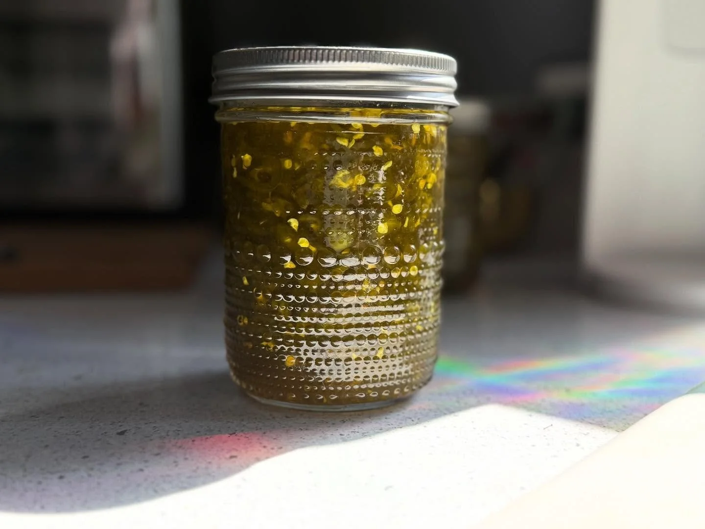 Candied jalape&ntilde;os are in the fridge and I&rsquo;ll report in four weeks if they&rsquo;re worth the lung issues that I will obviously have now. (Used the mandolin though and kept ALL fingers!!) #candiedjalape&ntilde;os #putthemoneverything 🌶️