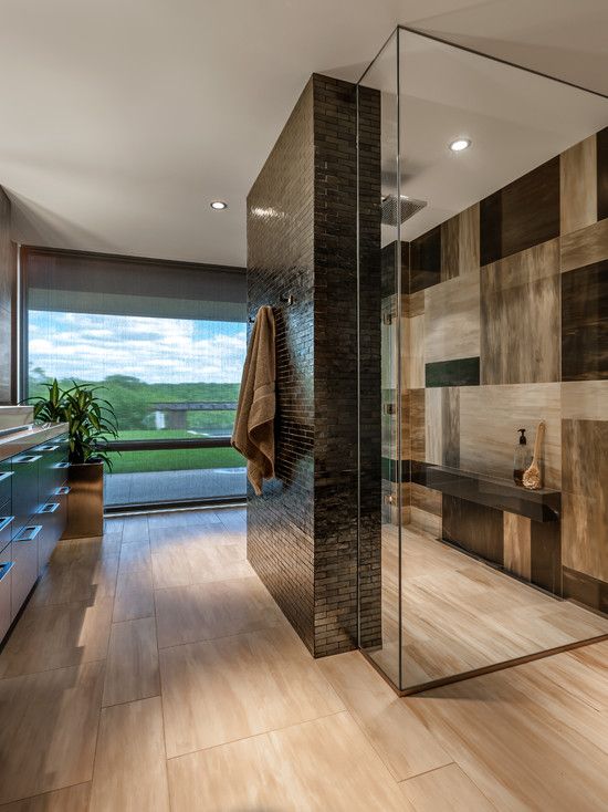 contemporary glass and stone bathroom
