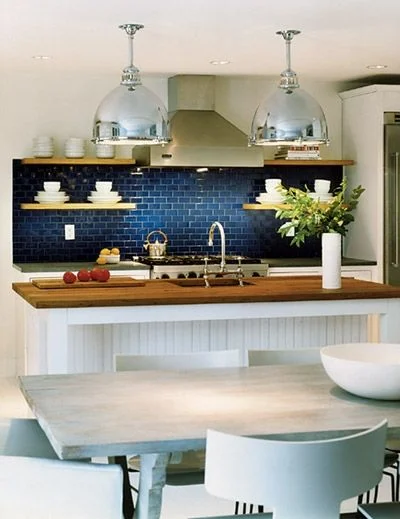 white kitchen with blue plashback