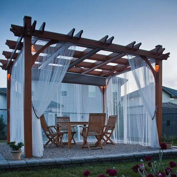 Infuse ethereal charm to your garden pergola by adding gauzy curtains to one or more sides. Use different curtain material to match your needs – thicker for more privacy, prints and colours for more vibrancy. 😍  #RenoGuide #Dining #OutdoorDining #OutdoorLiving #InteriorDesign #Pergola #ModernHomes #Design #Backyard