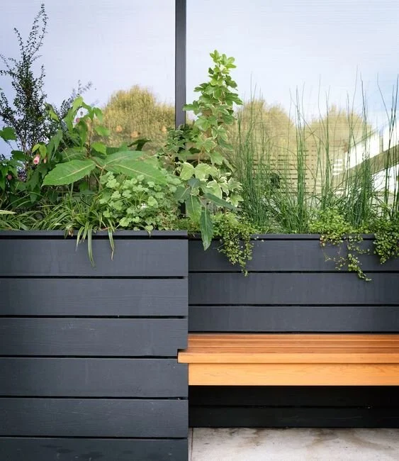 Image of Concrete fence planter with a rustic design