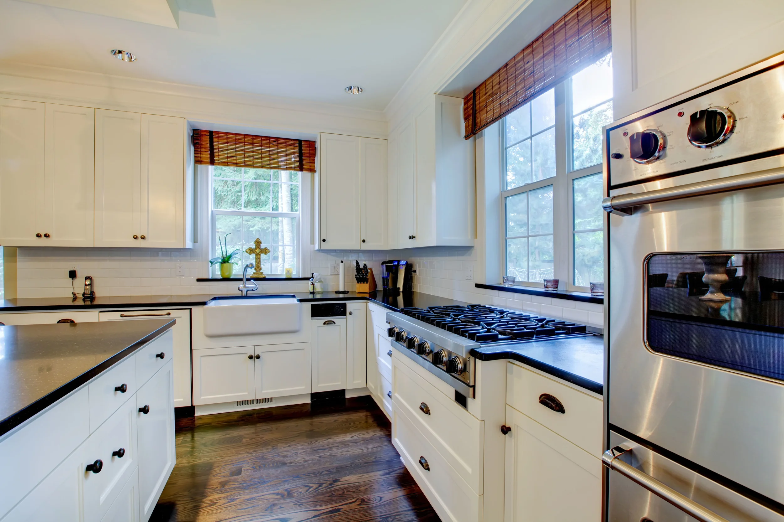 Luxurywhitekitchenwithdarkfloors..jpg