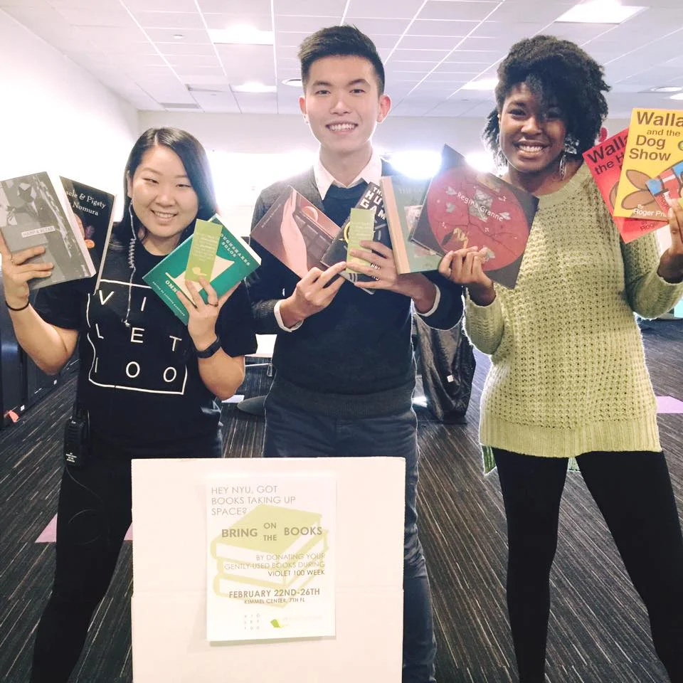Jason at a book drive with Carolynn and McKenzie