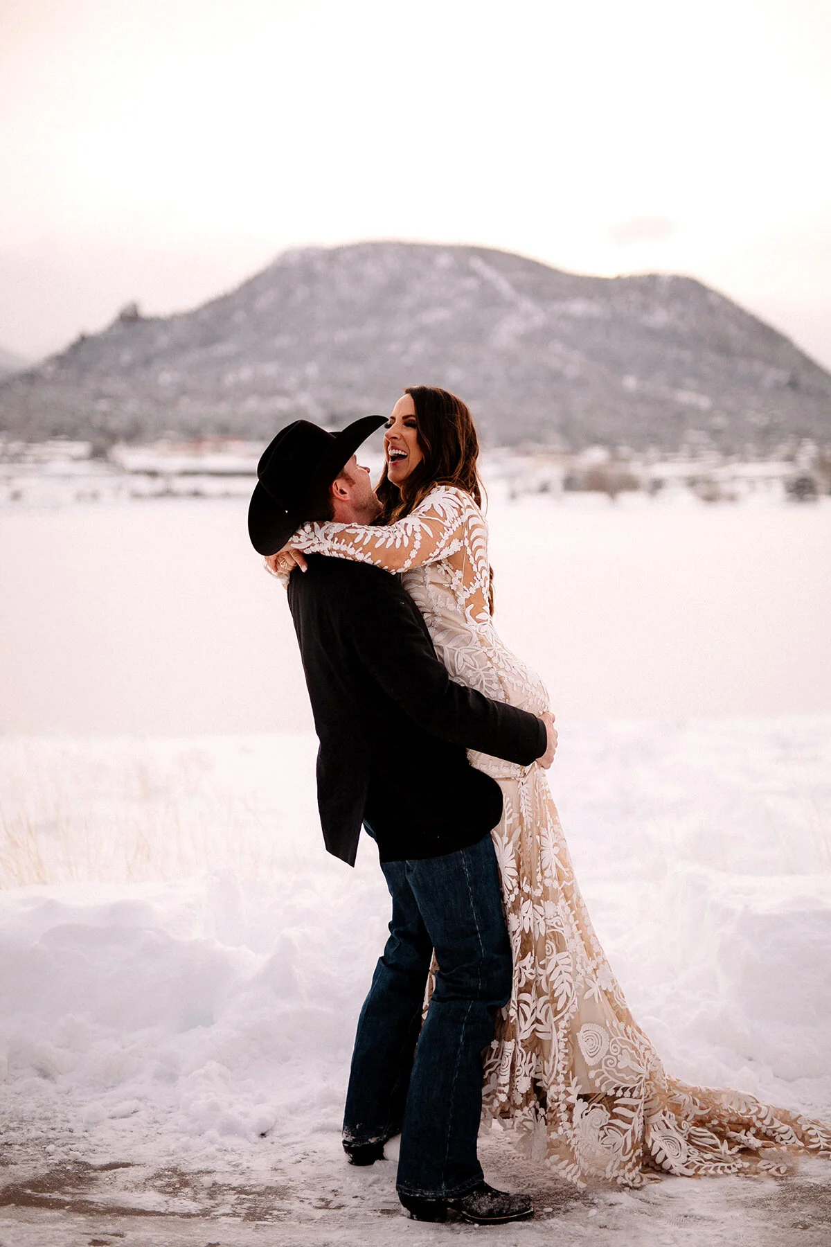 Estes Park Wedding Photographer Saint Catherine's Chapel on the Rock Avril Gown Florist Rocky Mountain National Park Denver Colorado Elopement Winter Wedding Allenspark Liz Osban Photography Destination Denver Wyoming Snowy Rue De Seine Boho