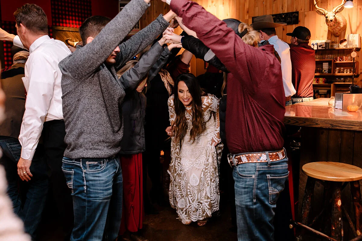 Estes Park Wedding Photographer Saint Catherine's Chapel on the Rock Avril Gown Florist Rocky Mountain National Park Denver Colorado Elopement Winter Wedding Allenspark Liz Osban Photography Destination Denver Wyoming Snowy Rue De Seine Boho Elkins Distilling Co