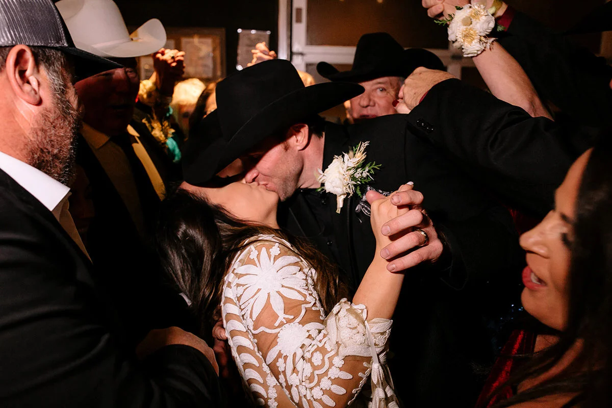 Lacey’s family has a traditional wedding dance where they crowd around the newlyweds in and out after the line arch dance!