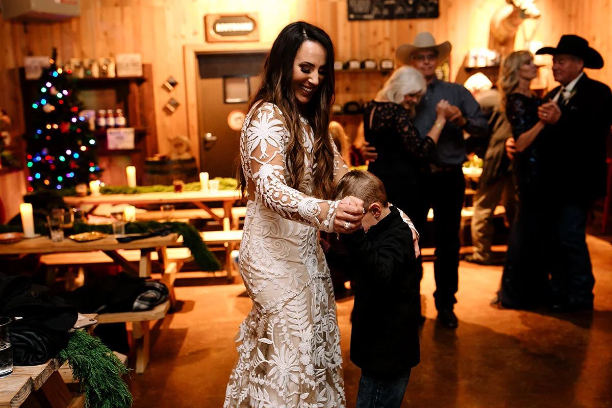 Estes Park Wedding Photographer Saint Catherine's Chapel on the Rock Avril Gown Florist Rocky Mountain National Park Denver Colorado Elopement Winter Wedding Allenspark Liz Osban Photography Destination Denver Wyoming Snowy Rue De Seine Boho Elkins Distilling Co