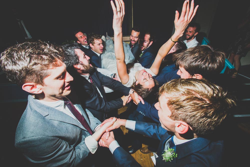 Rock and Roll Bride | She dives into the crowd at her wedding reception | Best Welsh wedding Photographers