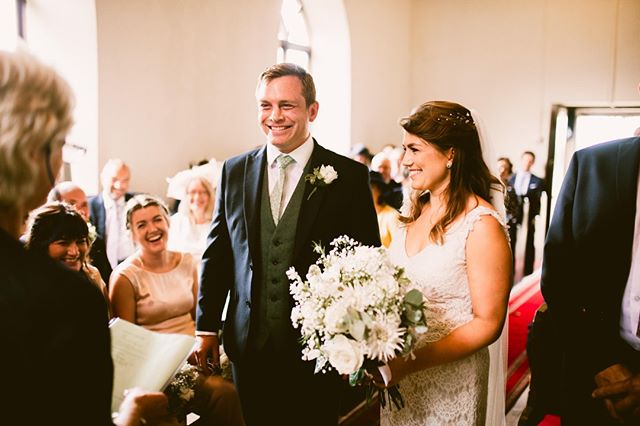 When Sarah walked down the aisle to see Sam waiting their waiting for her. They both had a massive smiles on their face as the golden light filtered through the beautiful ancient welsh chapel. It was one perfect moment from a perfect day filled with 