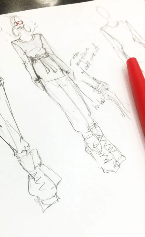 Fashion designer Delaya Briscoe, making a long sleeve t-shirt with zip up cuffs.