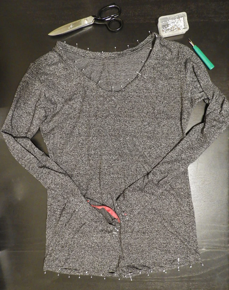 Fashion designer Delaya Briscoe, making a long sleeve t-shirt with zip up cuffs.