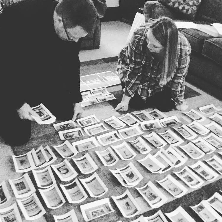 Simon and Eve helping Sue to curate and group pieces for the show - 166 works in total!
