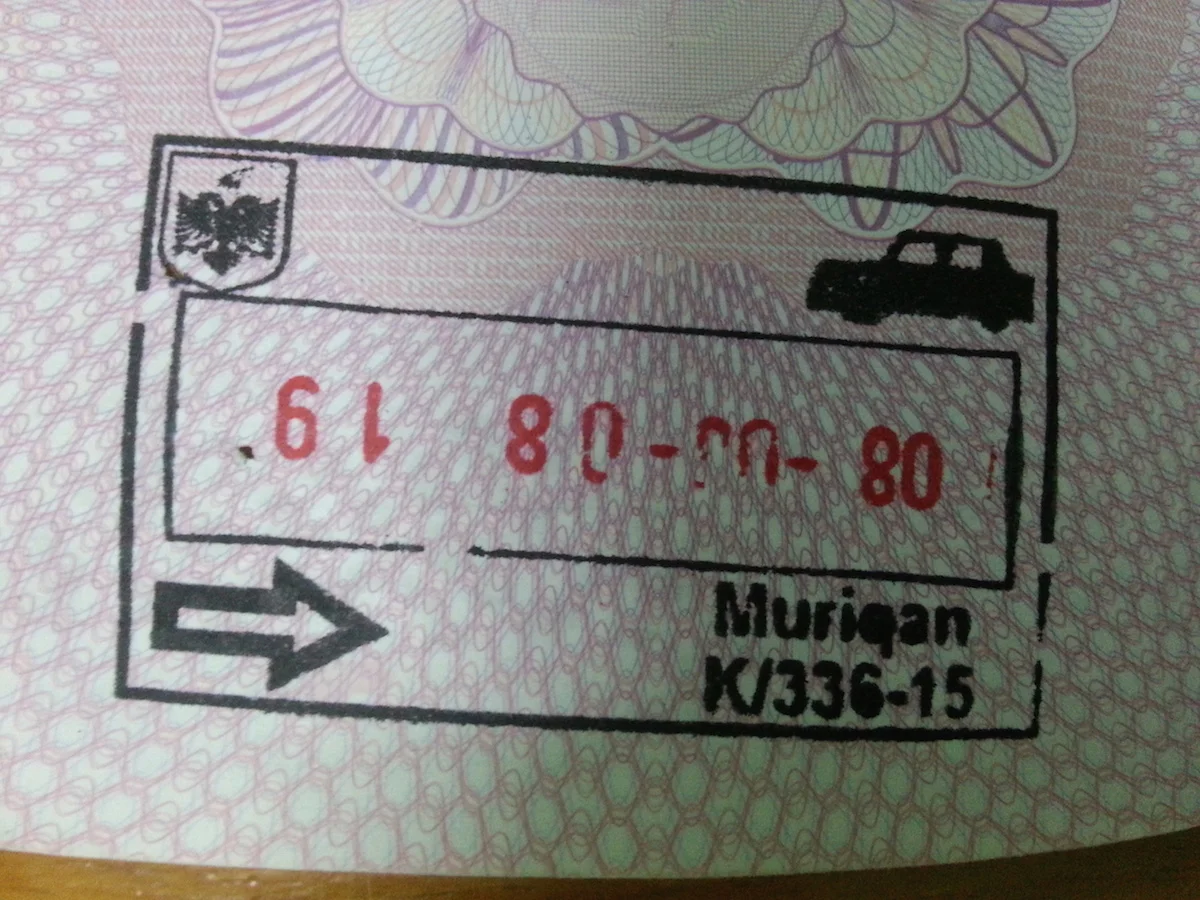 Pic: Entry stamp at Muriqan, Albania. Albania is known as the "Land of Eagles", hence the national insignia in the top left corner.