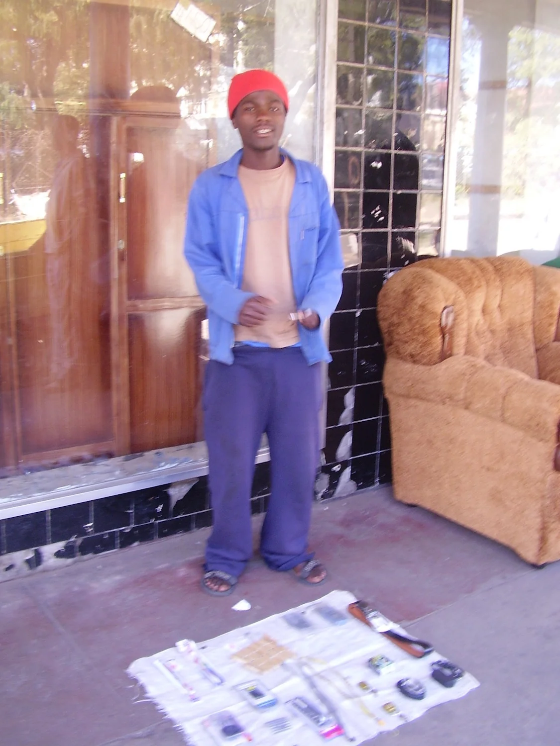 Pic: Young man selling mobile phones and accessories, Bulawayo.