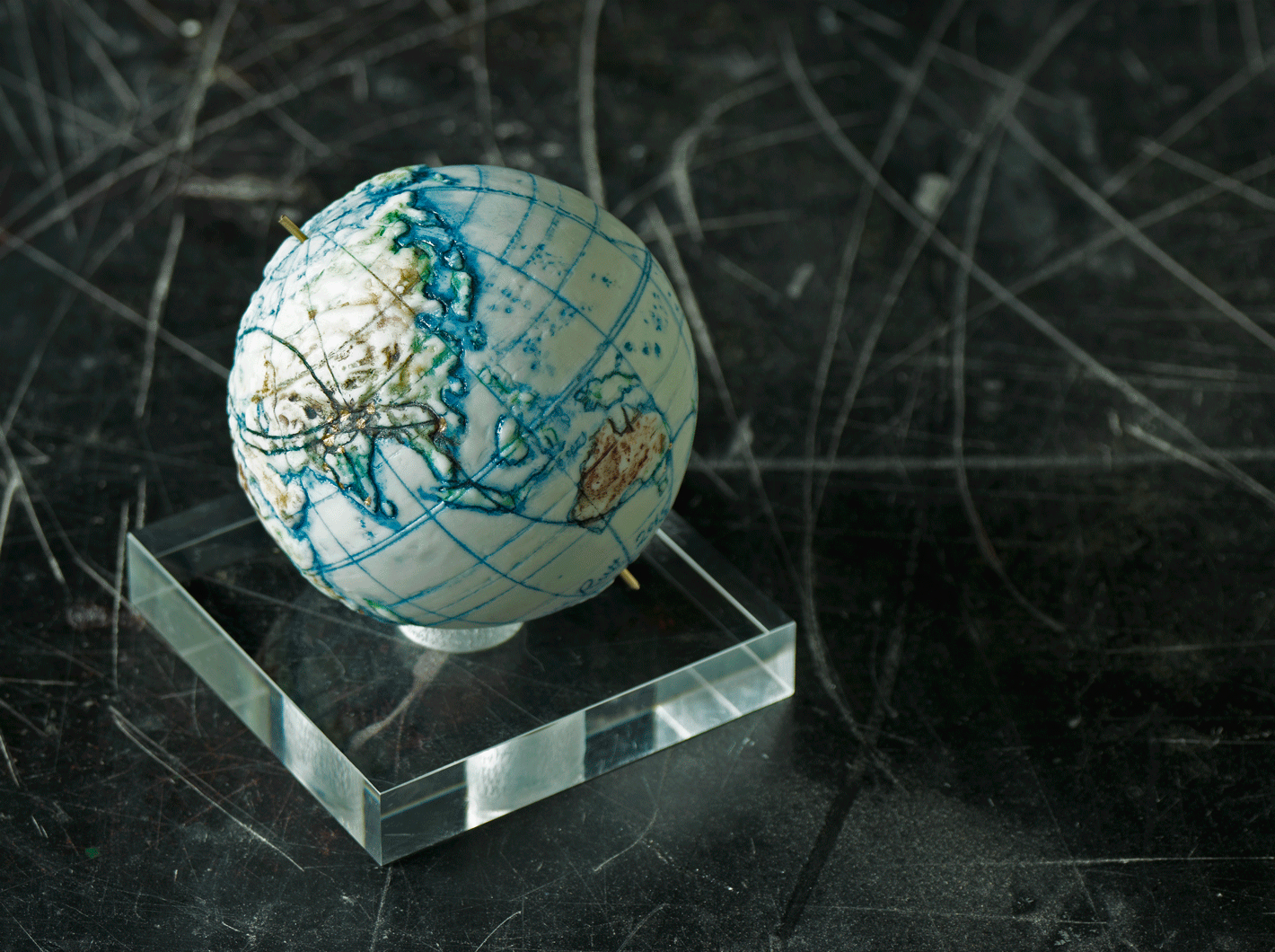 Your primary destinations, and significant places are marked with a tiny dot of gold lustre, rendered permanent by firing onto the globe .