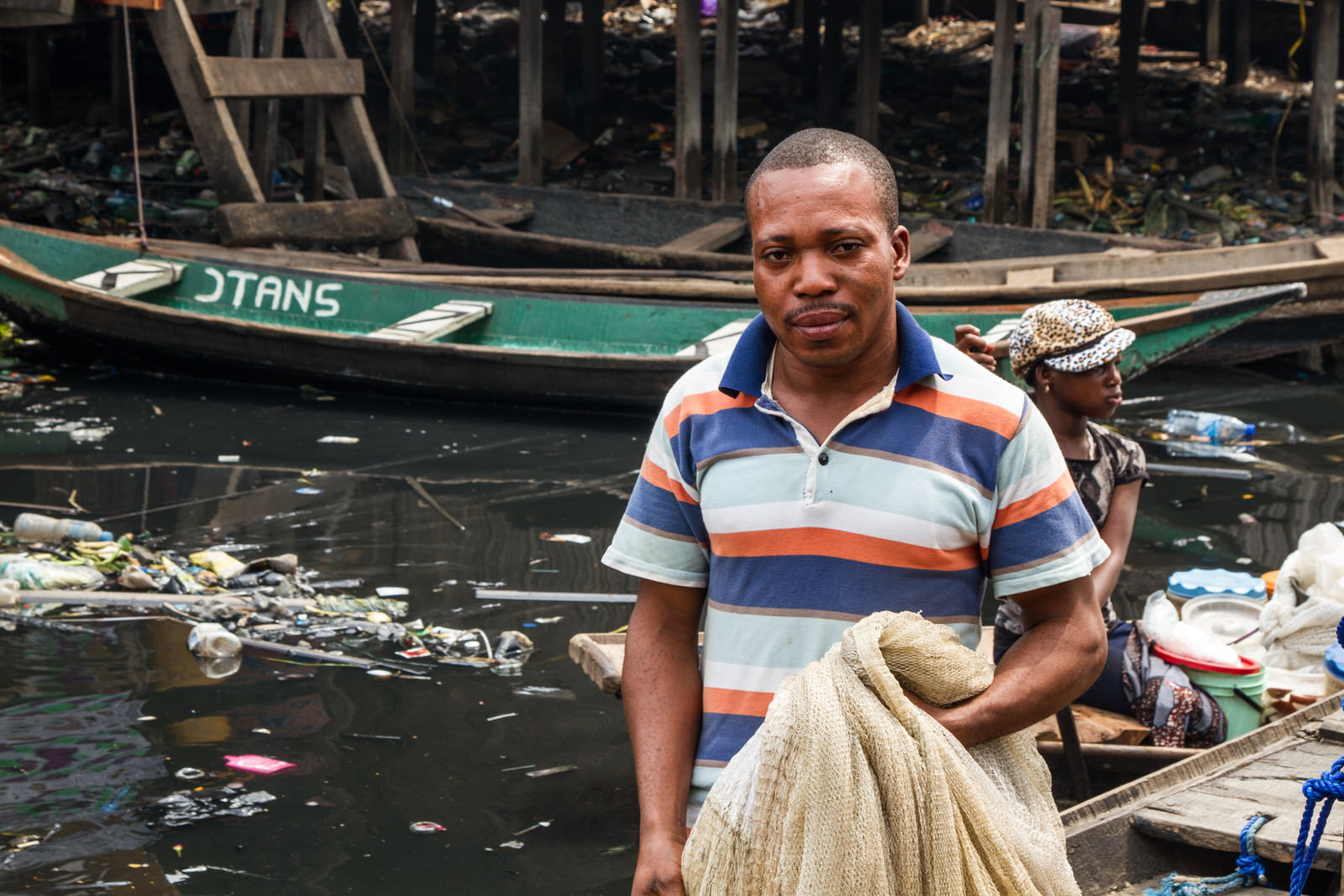 This fisherman is from the community, and lives close to Gerard. He invited his sister, who had lived in Otodo Gbame during the evictions, to come and stay with him when her house was demolished.