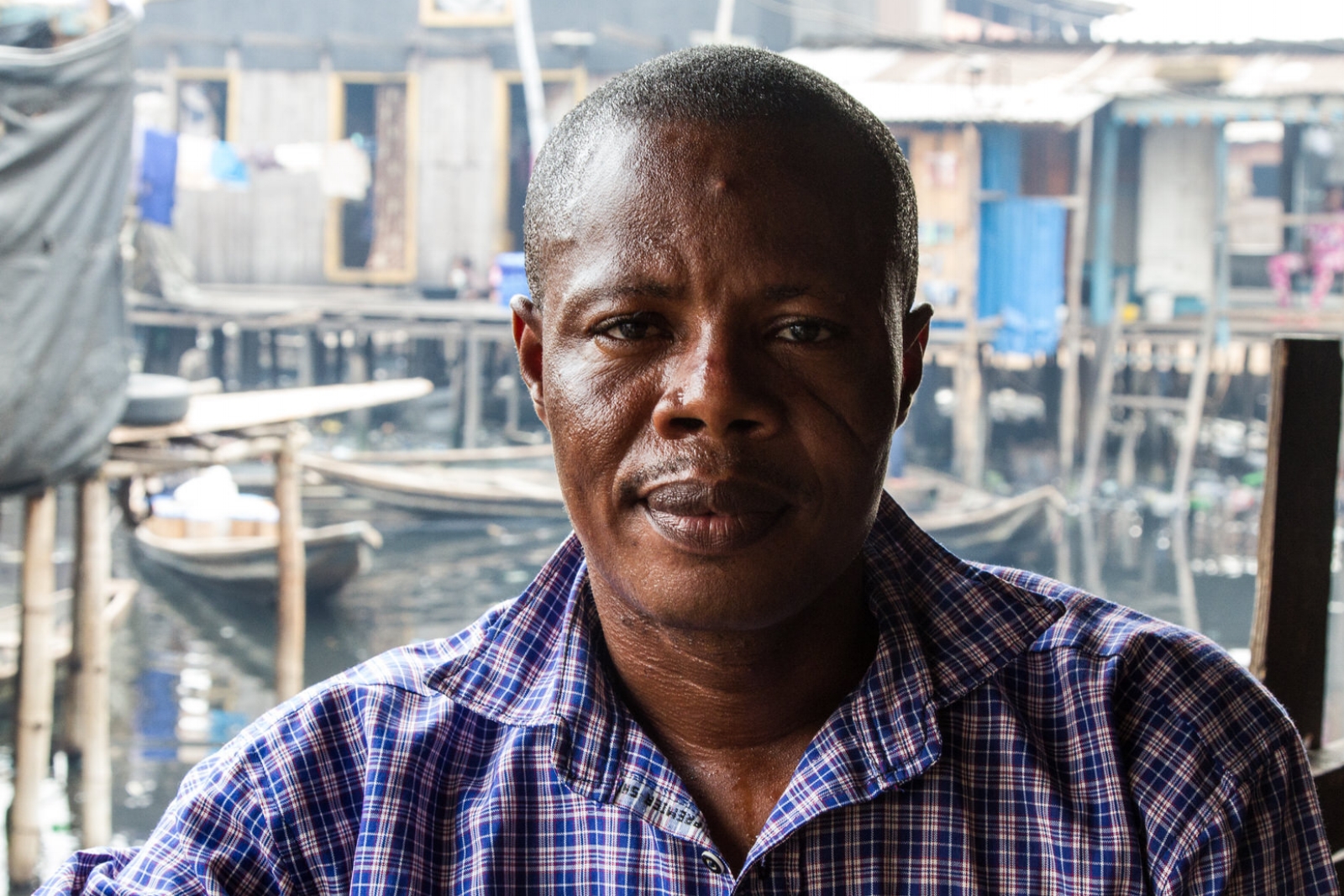  Gerard Avlessi is a community leader in Sogunro. He is also a member of the Nigerian Slum / Informal Settlement Federation, and has been involved in Federation activities for the last few years.  He and a few others have been leading the outreach to