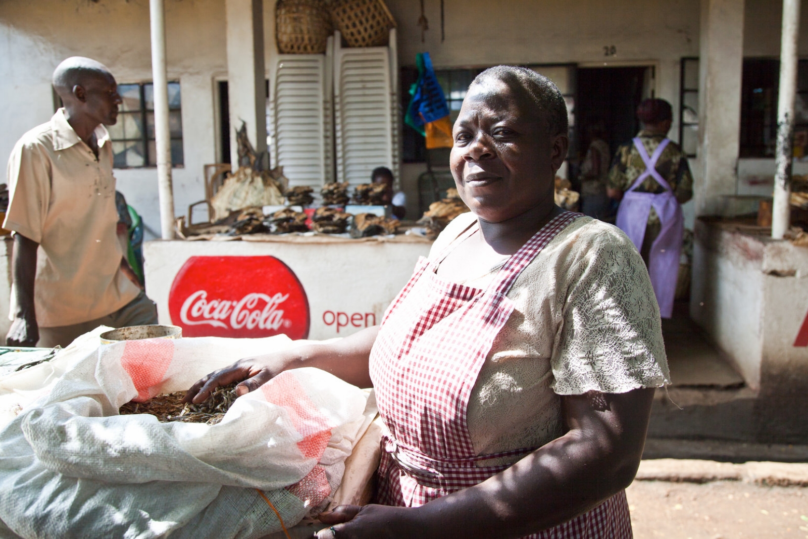 Dorothy was forcibly relocated from Oile market. After its destruction she found herself at Jubilee market. Dorothy is now supporting thirteen children, many foster children from other family members who have died.