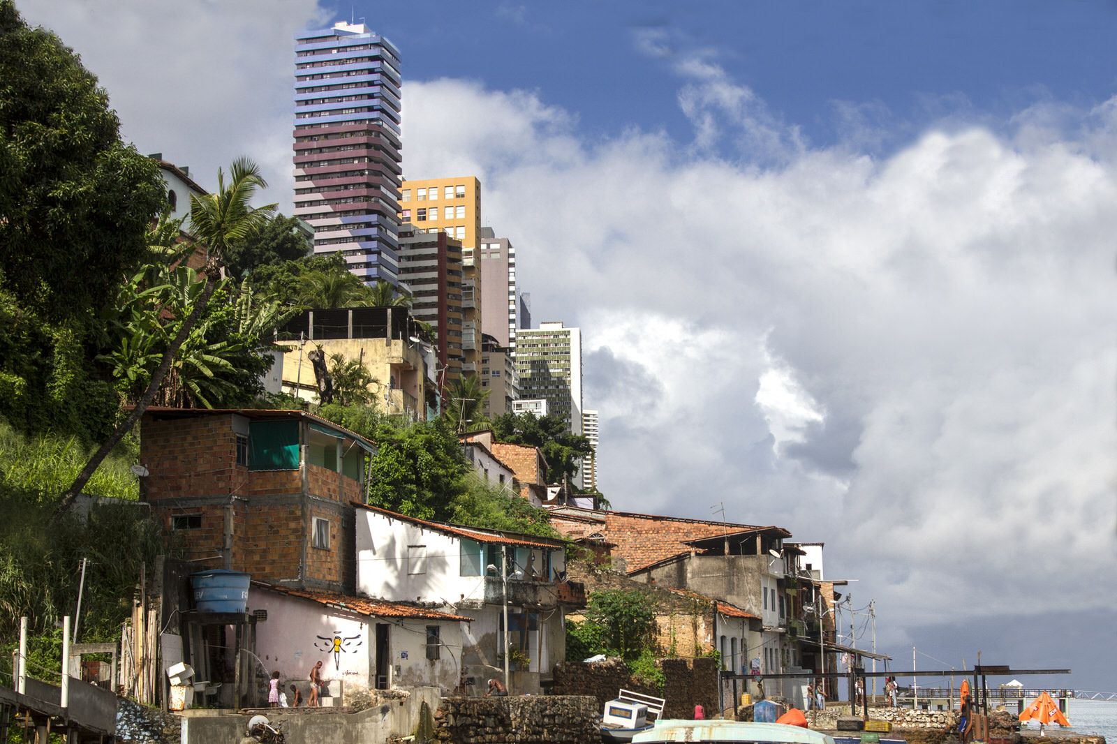  Luxury high-rise blocks overlook Gamboa de Baixo. This community has been segregated partly because of the construction of the Avenue Contorno, a large motorway that seperates the community from the city. 