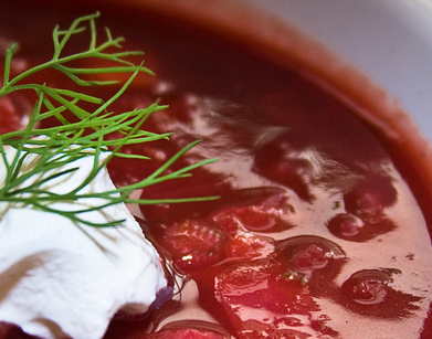 A nod to my Russian ancestors... There's nothing quite like Borscht soup in the winter. (It's also lovely chilled in the summer.) So with a fresh lot of produce from the Farmer's Market on the weekend, I decided to make a batch. All through my childhood, this was a dish that we had regularly. My Russian grandparents picked us up from school once a week. At that time, baboushka didn't have a driving licence. My grandfather always wore a hat, usually a peaked Kangol. As we approached the car, he would always get out and open the door for us. We were the only kids in the school with a Russian name, and that made us slightly unusual. Then as other kids noticed our grandfather opening the door, there was some talk that we were picked up by a chauffeur. That made us very unusual. Back at the house, baboushka would be quickly back in the kitchen, preparing and serving. Dinner was always early, and soup, mostly Borscht, was served first. The beetroot should be added last and not cooked for too long. This results in a gorgeous pinkish red soup, rather than a brownish / red soup. Other vegetables may be added to suit - leeks, turnip, parsnip. Ingredients: 2 large fresh beetroot, parboiled and cooled 1 onion, finely chopped 2 sticks celery, chopped 2 carrots, chopped 1/4 cabbage, shredded large can of diced tomatoes oil butter homemade chicken stock Peel and chop beetroot. Fry onion in oil and butter until soft. Add all vegetables, except beetroot and fry until softened. Season. Add tomatoes and mix. Pour in stock until desired thickness is reached and bring to a gentle simmer. Add beetroot last and simmer gently until tender. Serve with a dollop of sour cream, fresh dill and rye bread. *At one stage of the cooking, baboushka often added a few drops of soya sauce. She always told me not to tell anyone that she was adding a "Chinese ingredient" ! She said it improved the flavour. (I don't add soya sauce.)