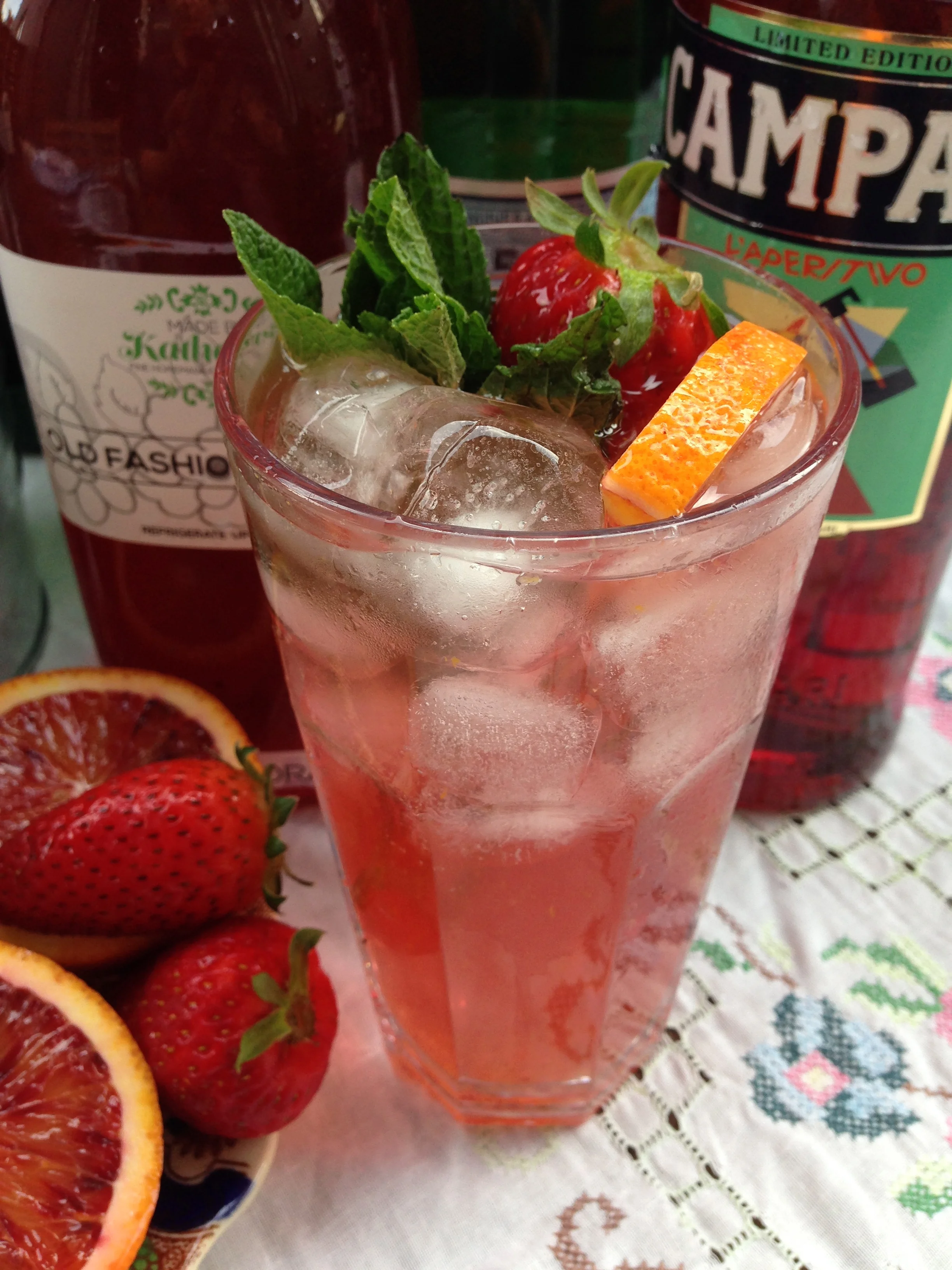 As soon as Blood Orange season starts, it seems as if we're headed for Christmas on that rollercoaster rush ! This year, I'm taking the time to "be present". It takes away all that unnecessary stress and manufactured urgency (cleverly used for marketing purposes !) This delicious and refreshing product is gorgeous over ice with soda water (as pictured), and garnished with mint and strawberries. Alternatively, it can be added to an endless list of summery cocktails - our favourite Campari, Pimms, Champagne, Vodka Tonic, Gin & Tonic, Mojito and more... These oranges make a delectable marmalade, or can be dried and dipped into chocolate. These make thoughtful holiday gifts with a difference. Time for a straight up, freshly juiced Blood Orange before some more kitchen production !