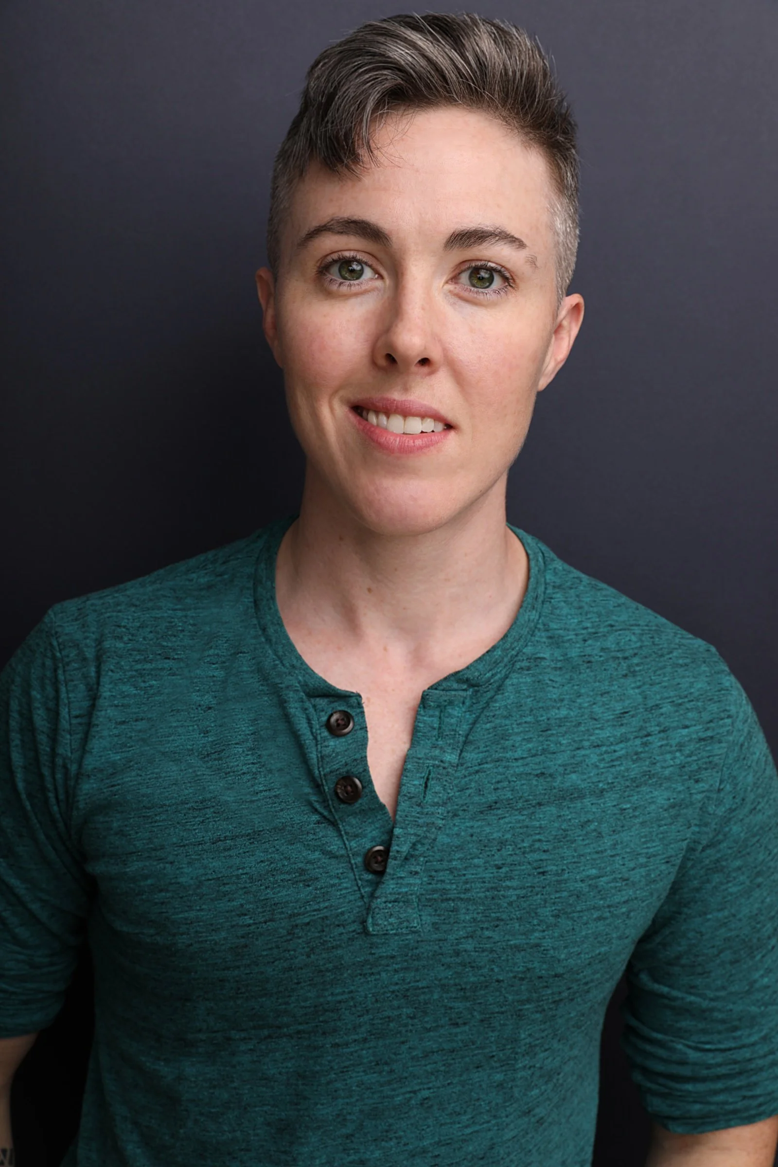 Eli Lynn headshot TEAL 1 MB.jpg