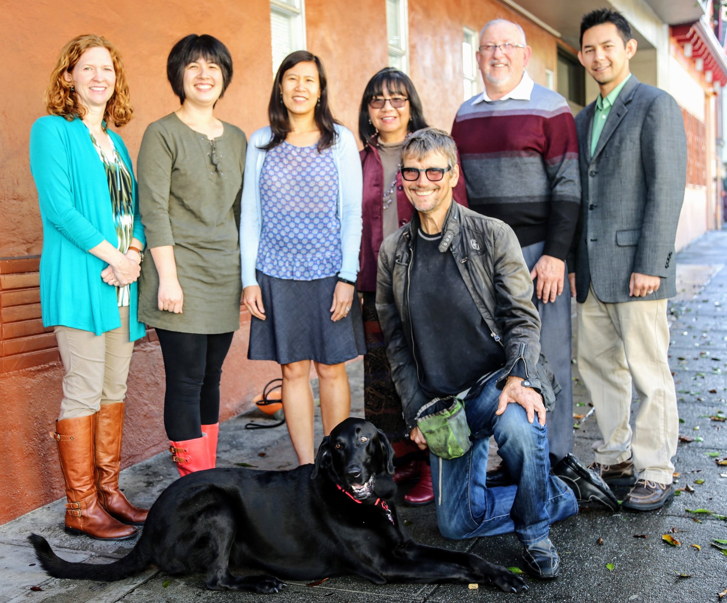 Jubilee staff, volunteer Spanish interpreters and Mallie, our adopted office dog