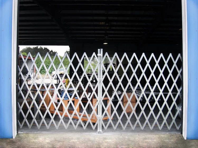 Folding Gates Best Rolling Doors Folding Gates Best Rolling Doors