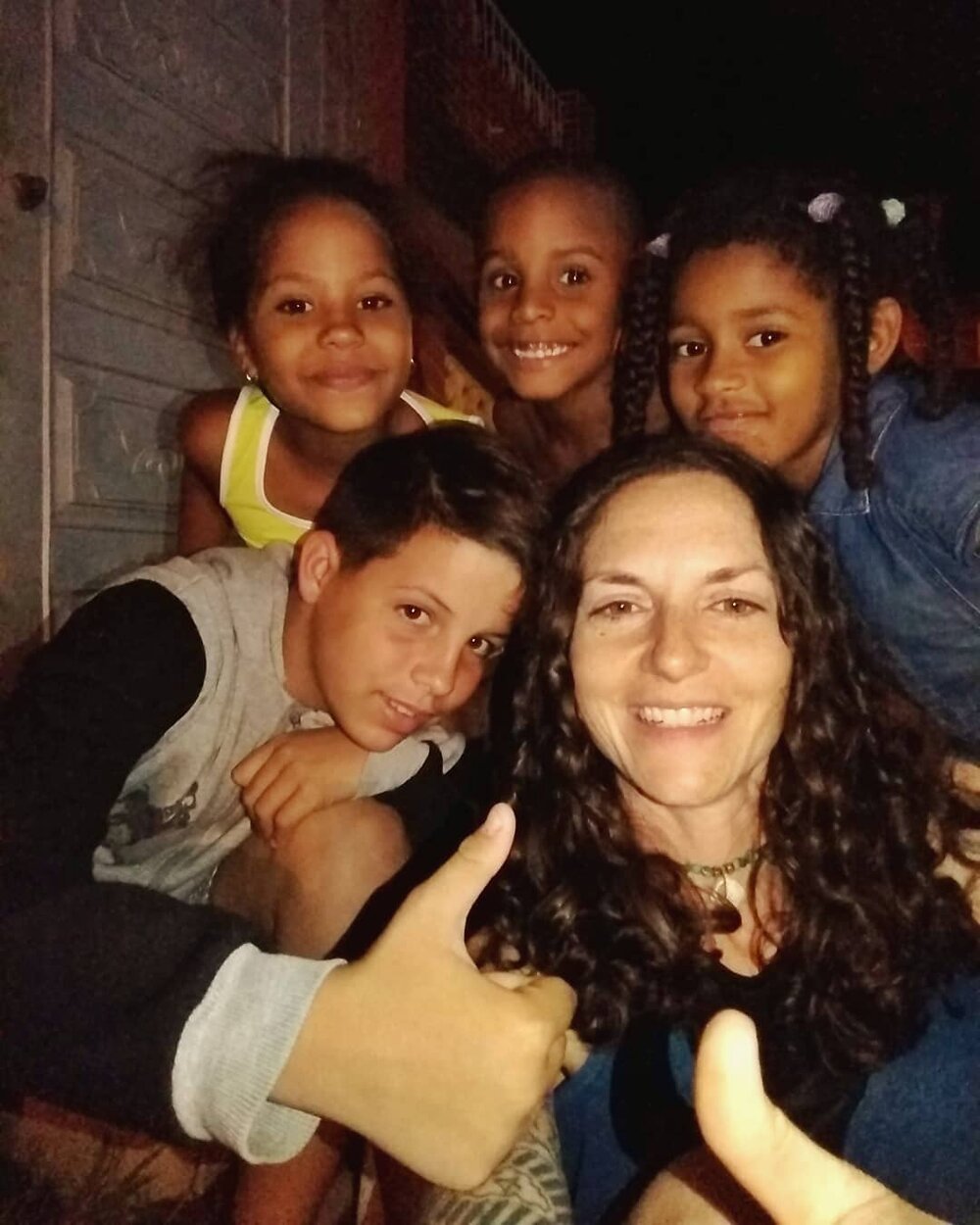 There are a lot of beautiful things about Cuban culture that I experienced in 2019. One of them is that kids play in the streets at night. Es seguro? Si, es seguro. These kids said yes, it's safe to play outside at night. Thumbs up, we want to be fri