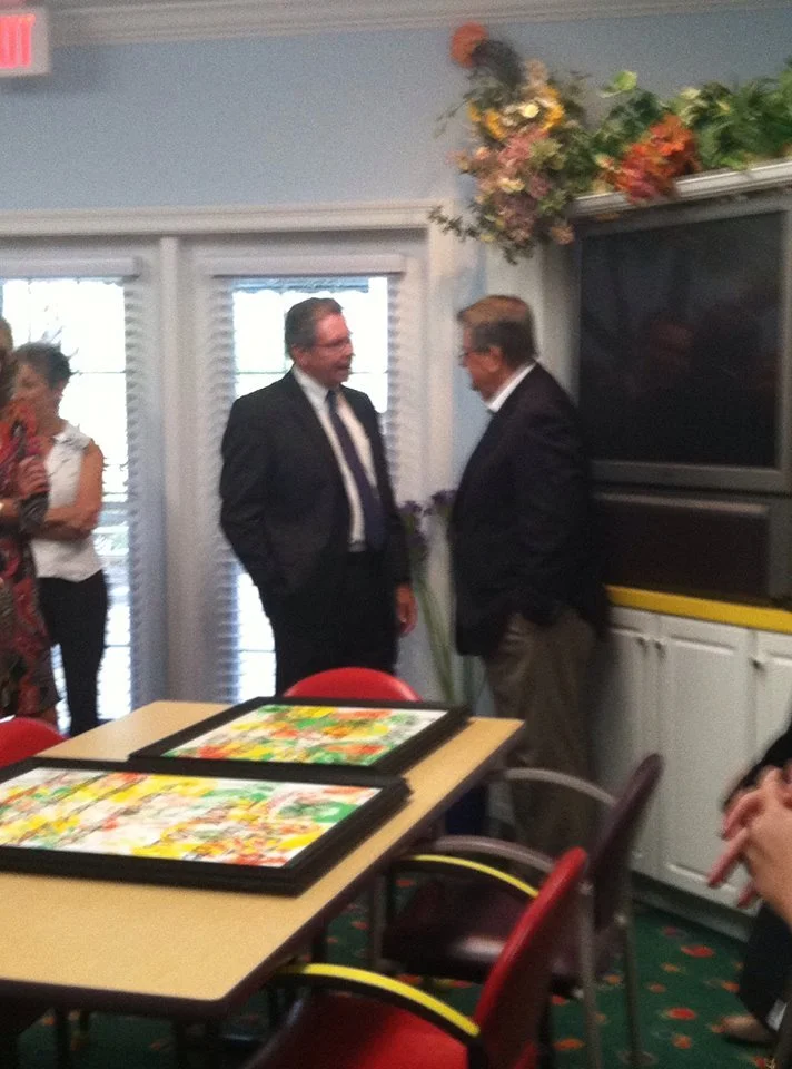 State Attorney Bill Eddins and Senator Gaetz talking.