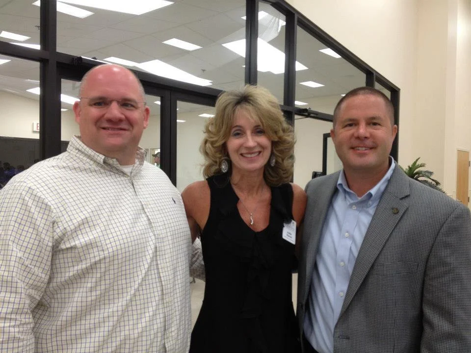 Sheriff Adkinson and CEO Julie Hurst at the retirement party for Graham Fountain