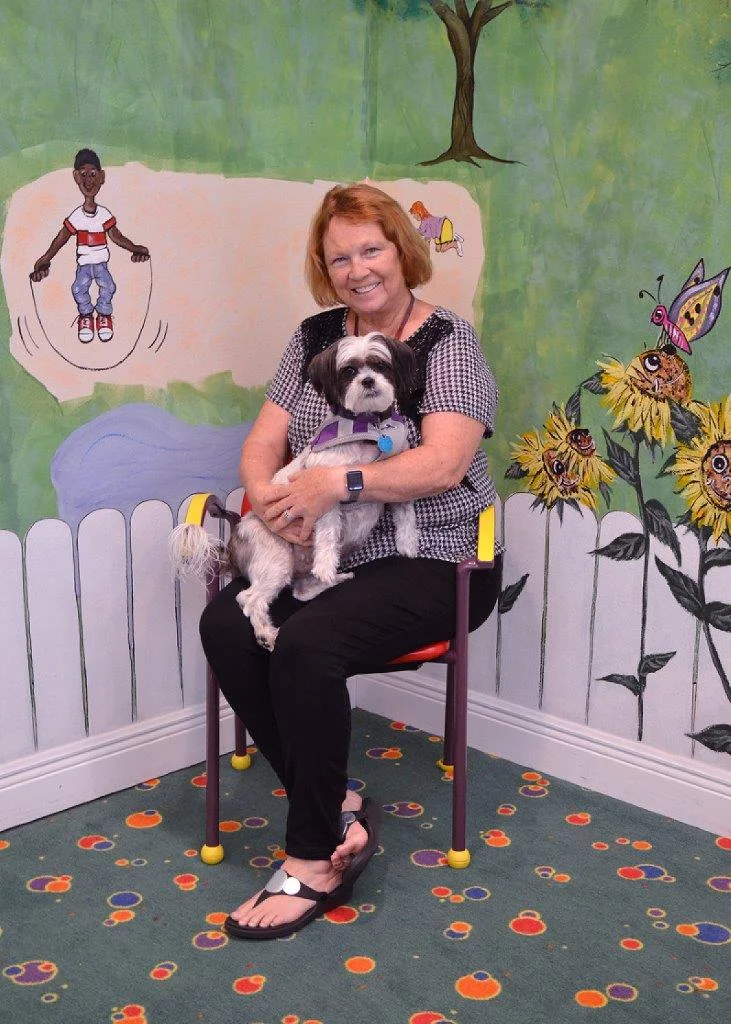 Deb Hollis and her Shih Tzu, Snoopy.