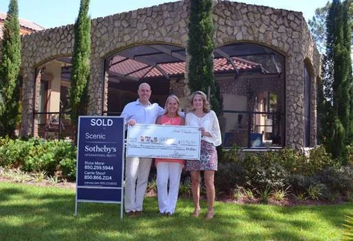 Scenic Sotheby’s International Realty generously donated over $13,000 of their commission to the Pierce Family Children’s Advocacy Center in Walton County. L-R: Blake Morar and Carrie Shoaf, with Scenic Sotheby’s and Julie Hurst-Porterfield, CEO ECCAC