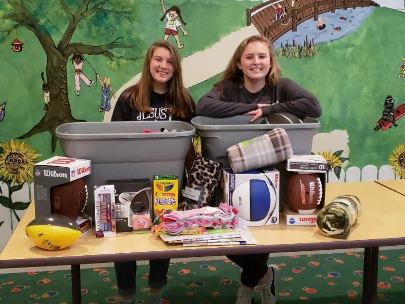 Angelina Makarova and Rebekah Cline are part of the Student Government Association at Rocky Bayou Christian School. They led a drive to collect teen gifts for Christmas. RBCS grades 7th-12th had a competition. The grade level with the most points got to have a casual day on Tuesday, Oct. 30th!
